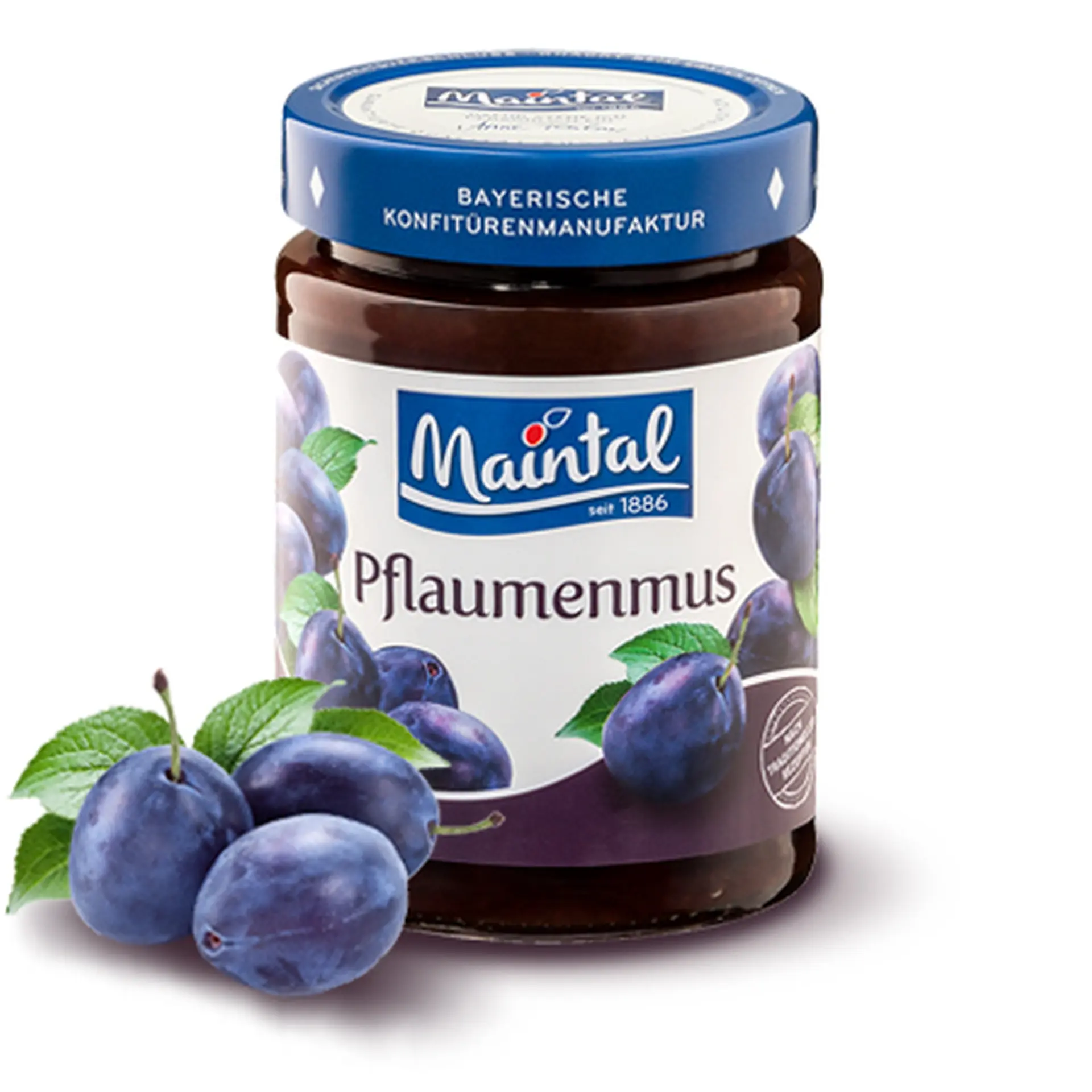 Pflaumenmus Glas Maintal Pflaumenmus, daneben Pflaumen.