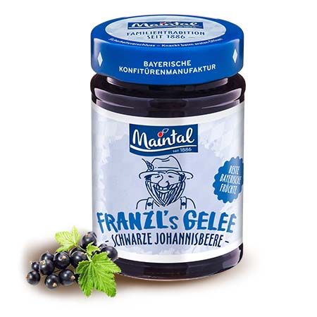 Schwarzes Johannisbeer-Gelee extra - Früchte aus Bayern Glas Maintal Schwarzes Johannisbeer-Gelee mit frischen Johannisbeeren daneben.