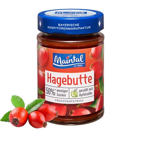 Hagebutten-Fruchtaufstrich, 50 % weniger Zucker Glas Hagebutten-Fruchtaufstrich, 50 % weniger Zucker, daneben Hagebutten