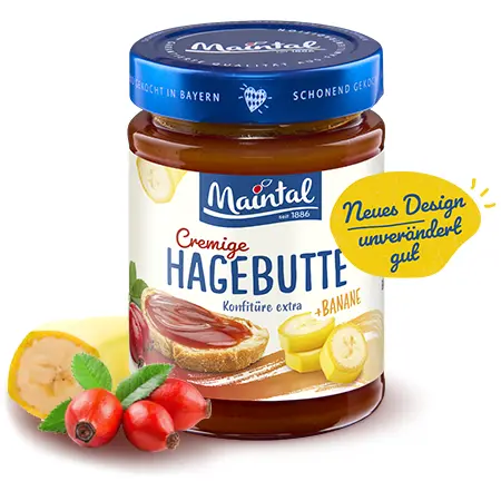 Hagebutten-Bananen-Konfitüre extra Glas Maintal Cremige Hagebutte mit Banane, umgeben von Früchten, mit Hinweis „Neues Design – unverändert gut“.