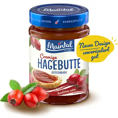 Hagebutten-Konfitüre extra Glas Maintal Cremige Hagebutte-Konfitüre, daneben Hagbutten, mit Hinweis „Neues Design – unverändert gut“.