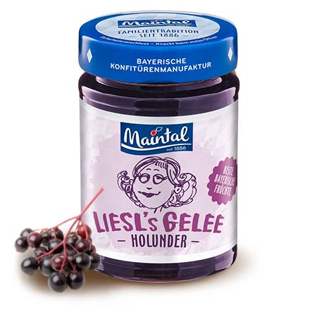 Holunderbeer-Gelee extra - Früchte aus Bayern Glas Maintal Holunderbeer-Gelee extra mit frischen Holundbeeren daneben.